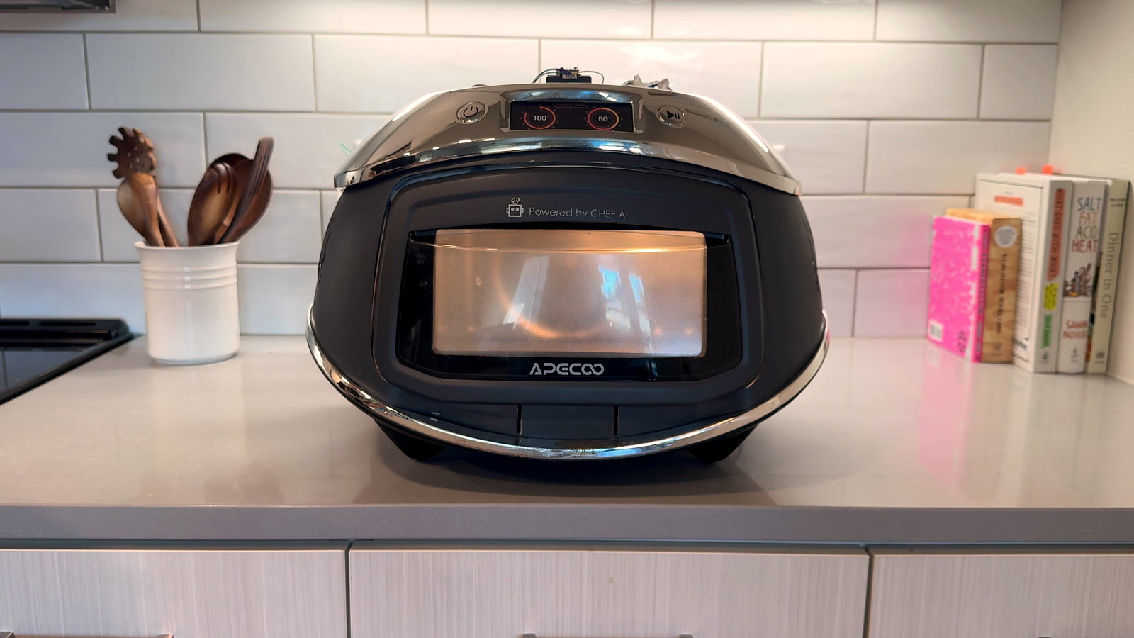 An OEM oven on a kitchen counter with CHEF AI inside