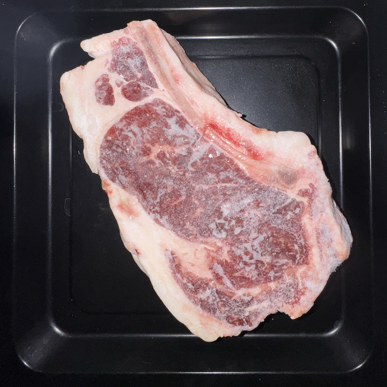 In-basket camera capture of a ribeye — what CHEF AI sees